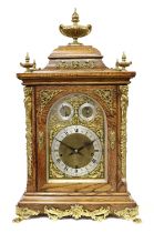 An Oak Chiming Table Clock, circa 1890, case surmounted by urn finials, gilt metal mounts, front