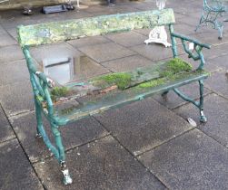 A VIctorian Cast Iron Garden Seat, late 19th century, repainted and in distressed condition, the