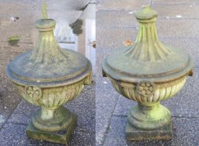 A Pair of Reconstituted Stone Classical Grecian-Style Garden Urns, with moulded finials above fluted