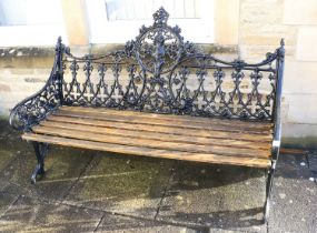 A Victorian-Style Cast Metal and Black-Painted Garden Bench, late 20th century, with gothic