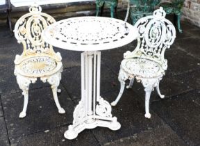 A Victorian Cast Iron Circular Garden Table, late 19th century, repainted cream, with foliate border