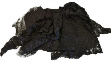 Early 20th Century Black Lace comprising two stoles and a fischu, lace flounces comprising a