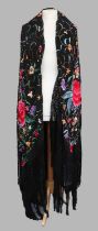 An Early 20th Century Chinese Large Black Silk Shawl, woven with vibrant coloured silk embroidered