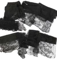 Early 20th Century Black Lace comprising a lace veil 165cm by 190cm, two similar lace flounces