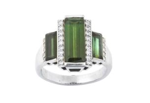 An 18 Carat White Gold Green Tourmaline and Diamond Ring three graduated emerald-cut green