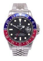 Rolex: A Stainless Steel Automatic Calendar Centre Seconds Dual Time Zone "Pepsi Bezel"