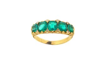 A Victorian Emerald Five Stone Ring the graduated square emerald-cut emeralds spaced by rose cut