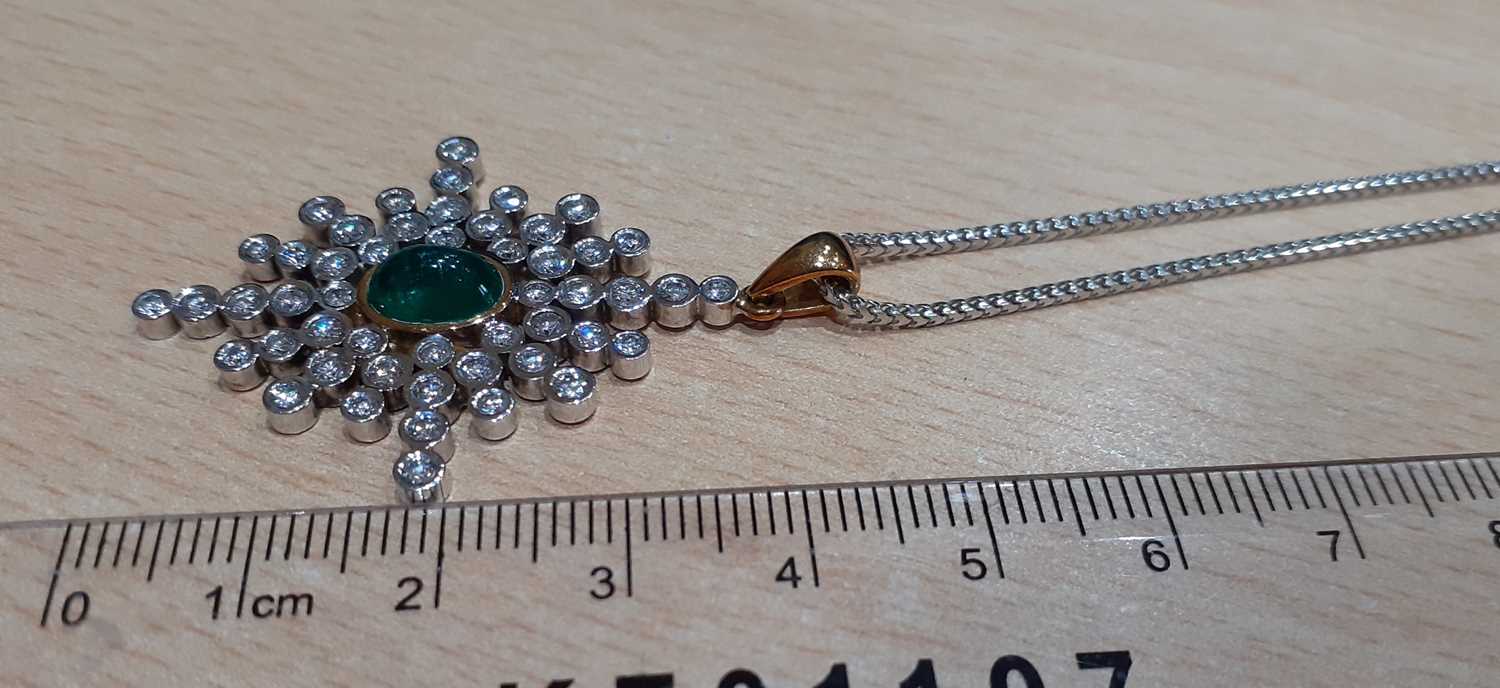 An Emerald and Diamond Pendant on Chain the stylised snowflake motif with an oval cabochon emerald - Image 2 of 4