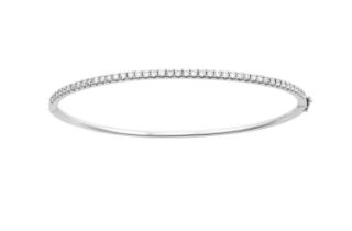 An 18 Carat White Gold Diamond Bangle, by Hirsh London the round brilliant cut diamonds in claw
