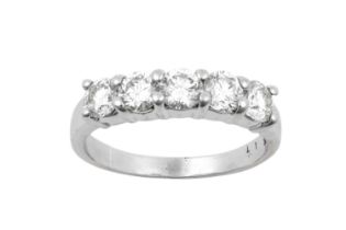A Diamond Five Stone Ring the round brilliant cut diamonds in white claw settings, to a plain