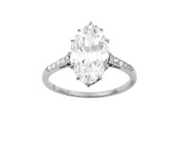 An Early 20th Century Diamond Solitaire Ring the oval cut diamond in a white claw setting, to