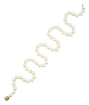 A Cultured Pearl Necklace, by Tiffany & Co. the fifty-five cultured pearls knotted to a grooved