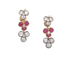 A Pair of Early 20th Century Ruby and Diamond Drop Earrings two old cut diamond clover motifs spaced