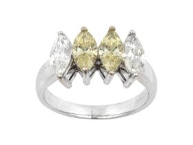 A Diamond Four Stone Ring two fancy yellow marquise cut diamonds flanked by two colourless