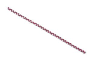 A Ruby and Diamond Bracelet the checkerboard pattern formed of calibré cut rubies and pairs of