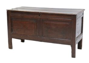 An Early 18th Century Joined Oak Chest, dated 1705 and initialled BI, the boarded hinged lid