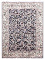 Kirman Ravar Carpet South East Iran, circa 1960 The deep indigo field with an allover design of