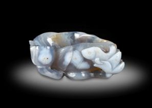 ~ A Chinese Grey Agate Small Brush Washer, Qing Dynasty, 18th/19th century, carved as a waterlily