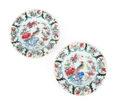 ~ A Pair of Chinese Porcelain Plates, Yongzheng/early Qianlong, painted in famille rose enamels with