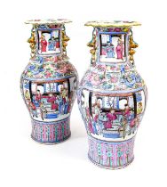 A Pair of Chinese Porcelain Baluster Vases, mid 19th century, the trumpet necks with mythical