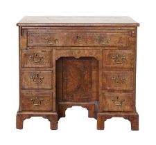 A George II Burr Walnut and Crossbanded Bureau-Table, 2nd quarter 18th century, the moulded