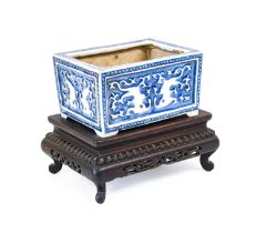 A Chinese Porcelain Planter, Qing Dynasty, probably 18th century, of rectangular form, moulded