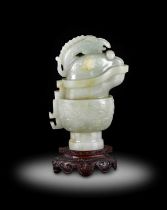 ~ A Chinese Archaistic Celadon Jade Ewer and Cover, Qing Dynasty, probably late 18th/19th century,