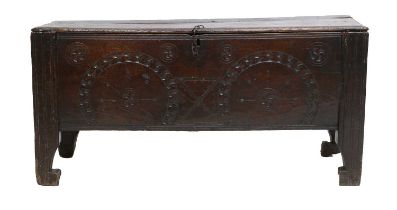 A Late 16th Century Oak Chest, of six-plank boarded construction, the hinged lid enclosing a