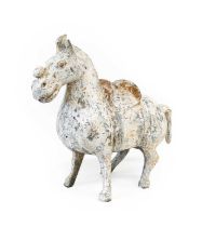 A Chinese Terracotta Horse, Tang Dynasty, standing crouched wearing a saddle 34cm long Provenance: