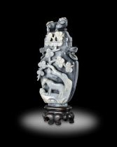 ~ A Chinese Two Colour Mottled Grey Jade Vase and Cover, Qing Dynasty, probably late 18th/19th