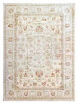 Afghan Ziegler Carpet, circa 1990 The ivory field of large scrolling vines centred by a small cusped