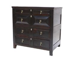 A Late 17th Century Oak Straight-Front Chest of Drawers, the boarded top above four oak-lined two-