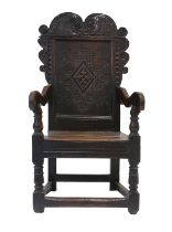 A Joined and Carved Oak Wainscot-Type Armchair, circa 1680, probably Leeds, the scrolled top rail