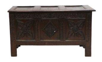 A Late 17th Century Joined Oak Chest, the moulded hinged lid with three panels enclosing a vacant