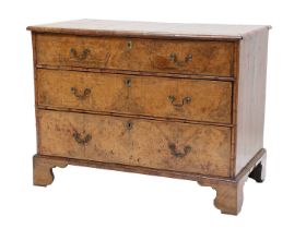 ~ A George II Burr Walnut and Crossbanded Straight-Front Chest of Drawers, 2nd quarter 18th century,