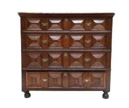 A Late 17th Century Geometric-Moulded Oak Chest, with two short over three long drawers, on turned