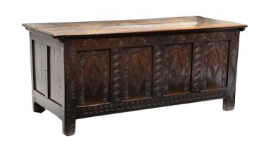 A Late 17th Century Joined Oak Chest, the boarded hinged lid enclosing a vacant interior above a