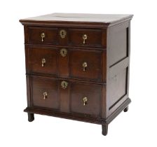 An Early 18th Century Joined Oak Chest, of attractive proportions, the moulded top above three two-