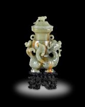 ~ A Chinese Celadon and Russet Jade Figural Vase and Cover, Qing Dynasty, probably Qianlong, as an