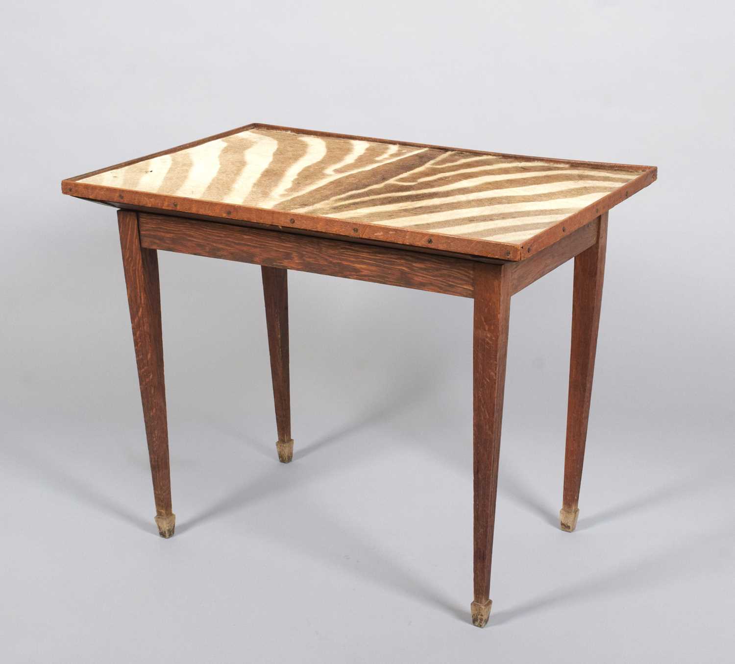 Animal Furniture: A Plains Zebra Hide Bridge Table, by Rowland Ward Ltd, 167 Piccadilly, London, the