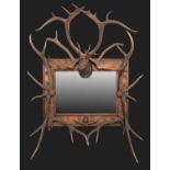 Antler Furniture: A Late 19th Century Austro-German Antler Mounted Overmantel Mirror, circa 1900,