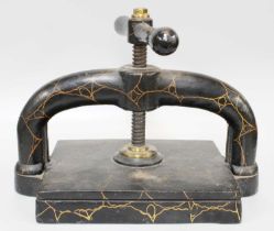 A Victorian Cast Iron Bookpress, with marbled gilding, 41cm wide