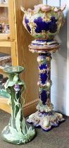 A Victorian Majolica Jardiniere on Stand, 124cm, together with a similar continental jardiniere