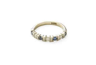 A Sapphire and Diamond Half Hoop Ring, four round cut sapphires alternate with three round brilliant