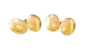 A Pair of Cufflinks, comprising of chain linked oval plain polished plaques Provenance: Dutton