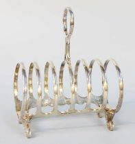 A Victorian Silver Toastrack, by James Dixon and Sons, Sheffield, 1898, oblong and on four scroll