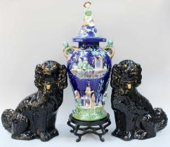 A Chinoiserie Majolica Urn and Cover, on associated wooden stand, 42cm (excluding base); together