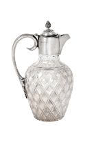 An Edward VII Silver-Mounted Cut-Glass Claret-Jug, by William Hutton and Sons Ltd., Sheffield, Circa