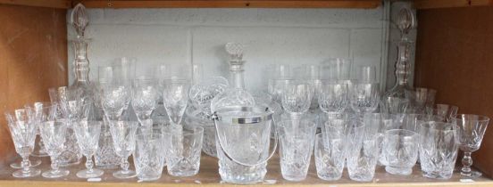 An Assembled Suite of Glassware, including a pair of decanters, a single decanter, a pair of navette