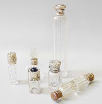 A Collection of Assorted Silver or Metal-Mounted Glass Scent-Bottles, including a cylindrical